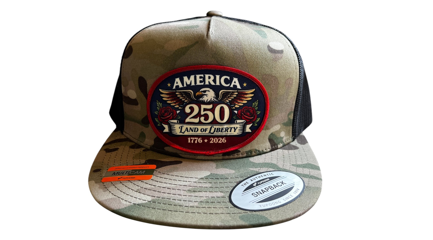 America 250 Land of Liberty multicam camo snapback hat with embroidered bald eagle patch, red roses, and 1776-2026 dates by Land of the Free 250