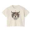 Beige t-shirt with a graphic design of a bull's head with an American flag and text on a white background