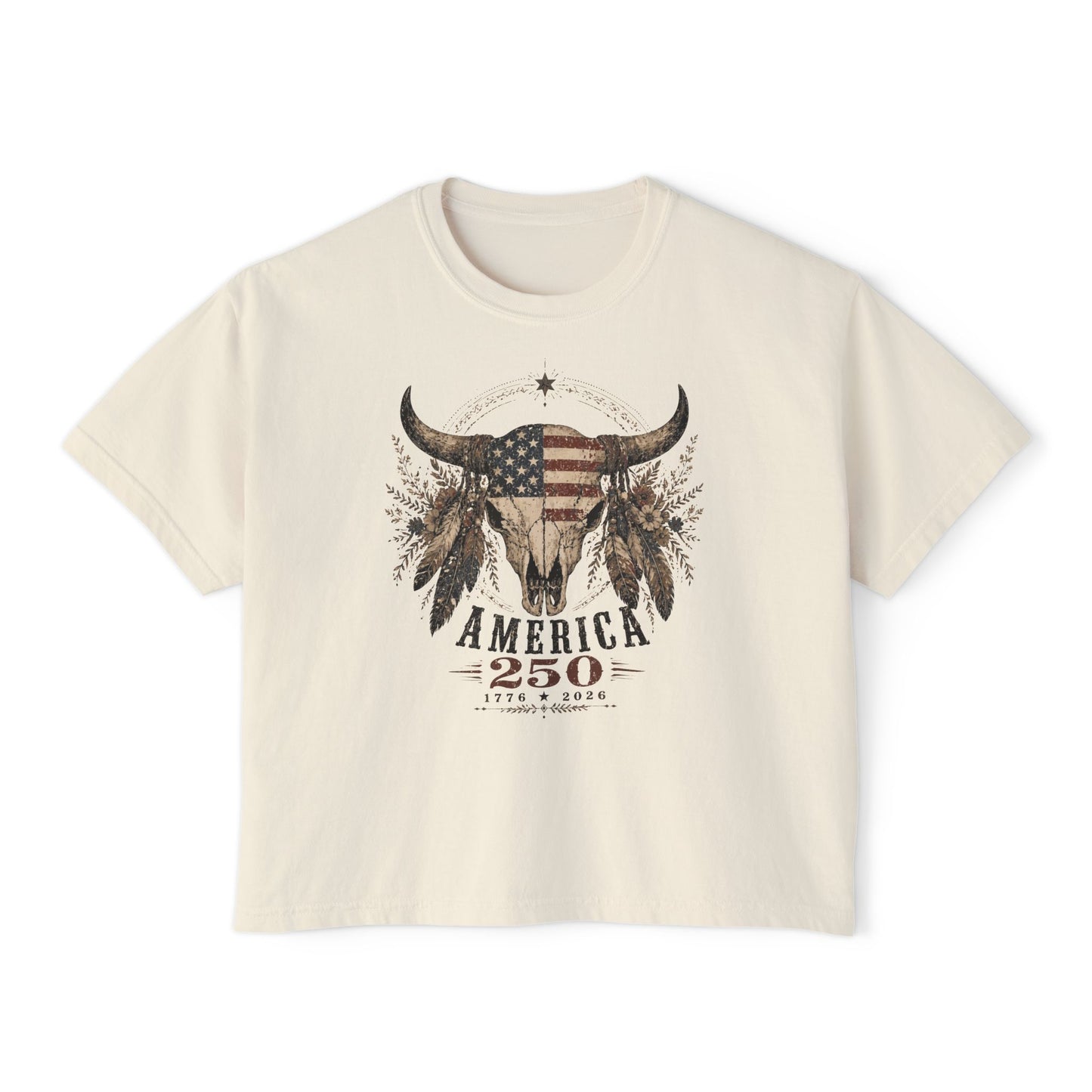 Beige t-shirt with a graphic design of a bull's head with an American flag and text on a white background
