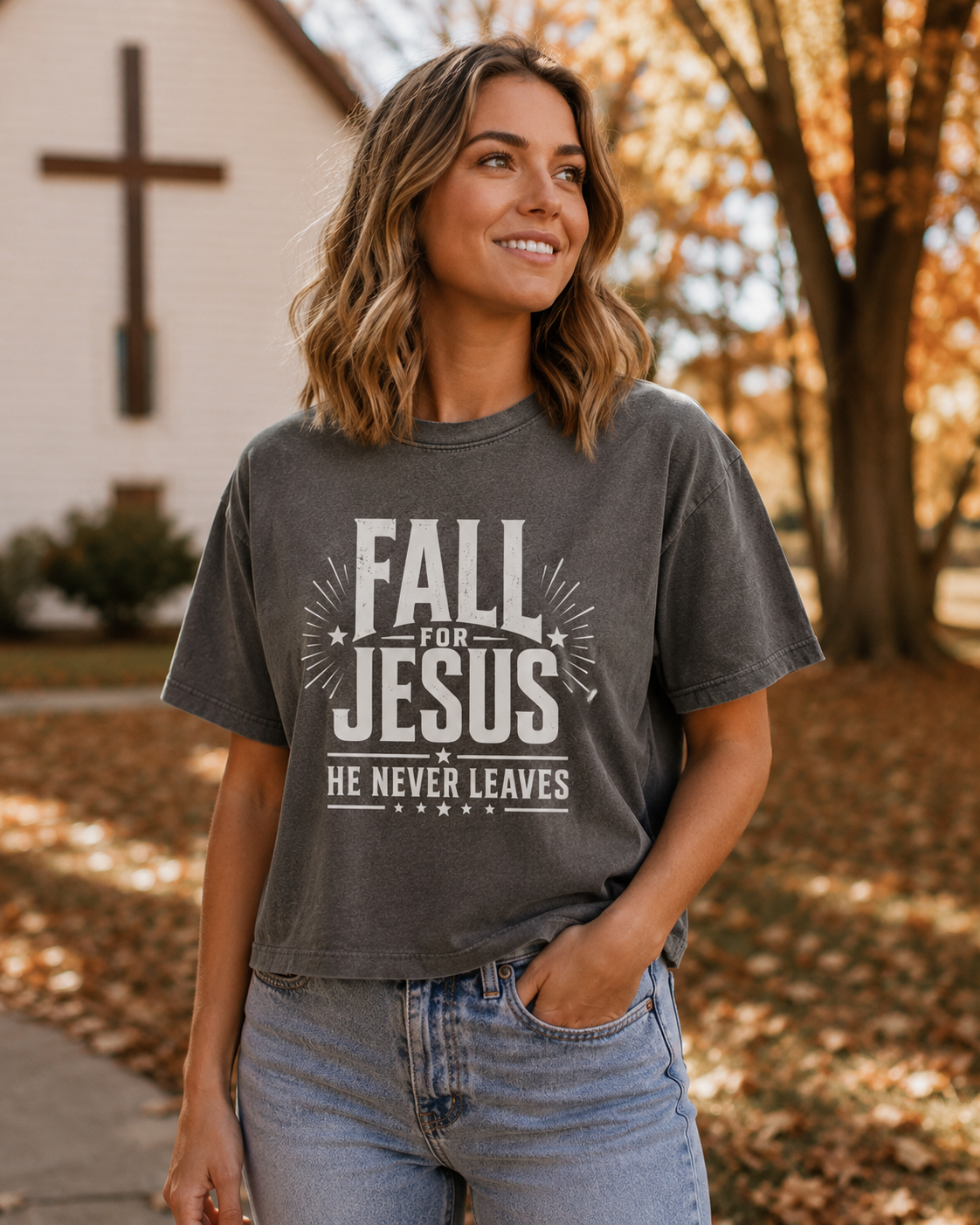 Standing in front of church wearing Fall for Jesus He Never Leaves women's boxy tee, comfort colors garment dyed shirt