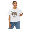 Woman wearing a white t-shirt with a graphic design on a white background