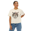 Woman wearing a white t-shirt with a graphic design on a white background