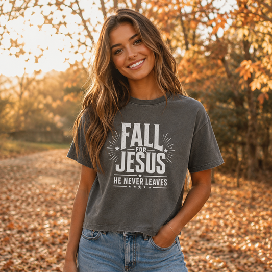 Girl with brown hair, stunning and parked like sitting wearing Fall for Jesus He Never Leaves women's boxy tee, comfort colors garment dyed shirt