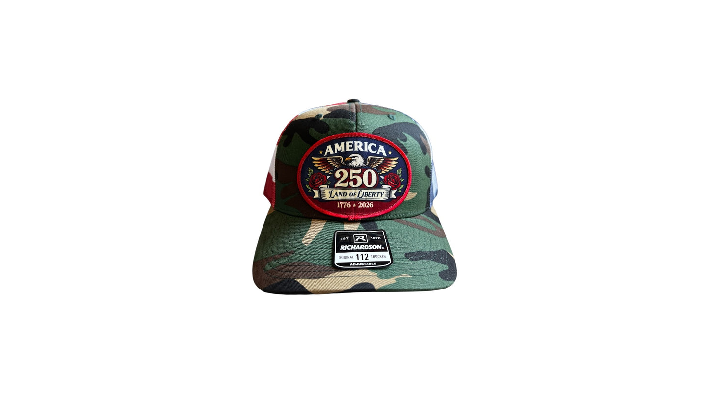 Camouflage baseball cap with a red and blue circular logo on a white background