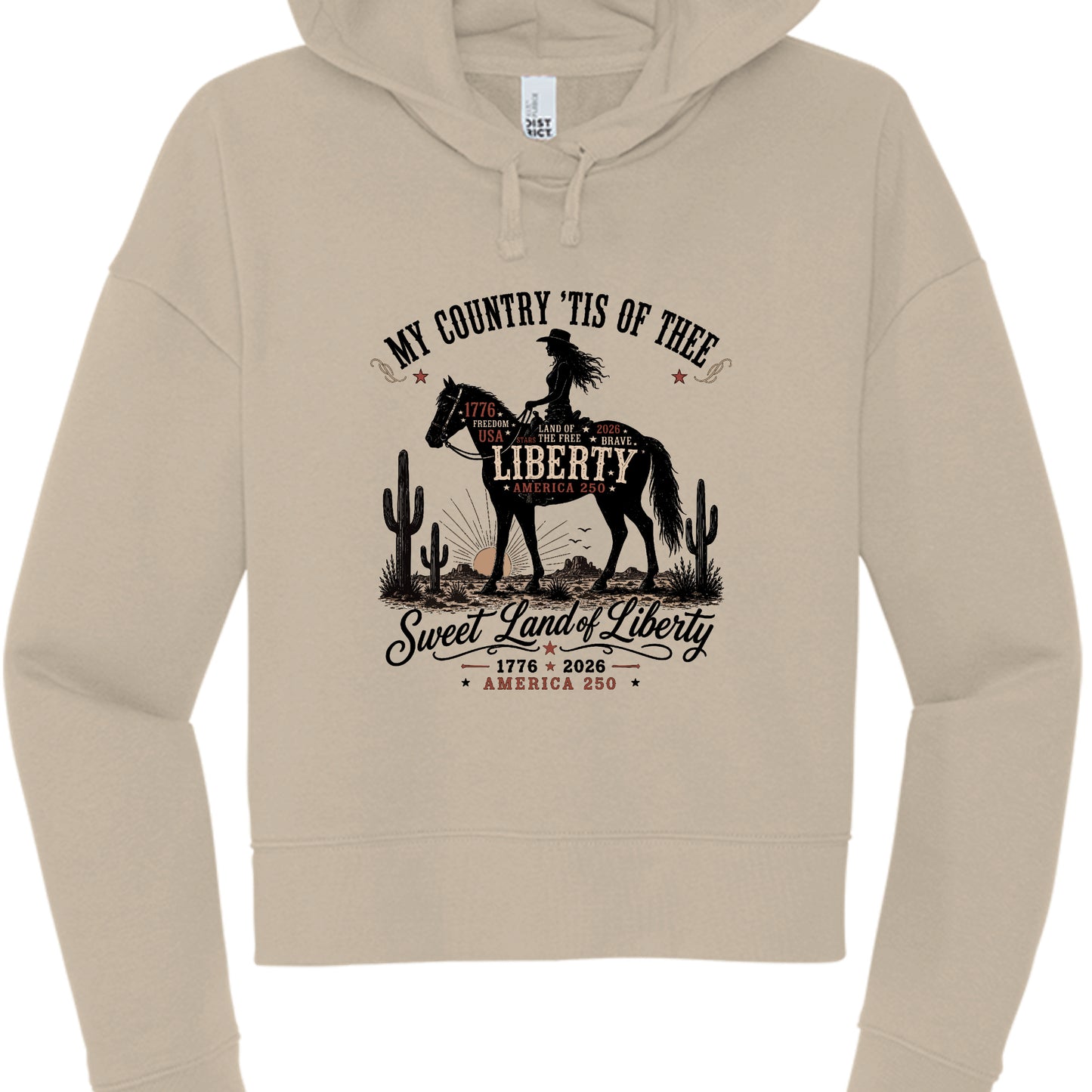 Women's tan patriotic cropped hoodie with vintage Western cowboy graphic reading My Country Tis of Thee Sweet Land of Liberty America 250 1776 2026
