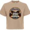 Women's tan patriotic tee with vintage tattoo style circular graphic featuring golden eagle red roses gold rope border and America 250 Land of the Free 1776 to 2026 design
