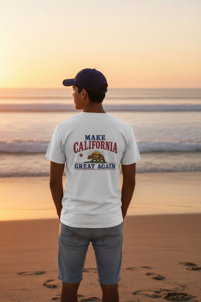 man standing on beach wearing a white make california great again t shirt design on back